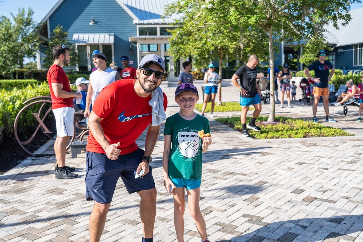 Pablo cheering on a young finisher